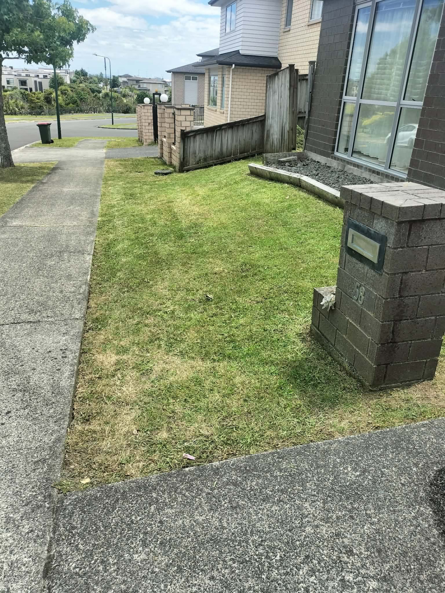 Front lawn and footpath edges cut clean by Tauwhare Lawn Care Services